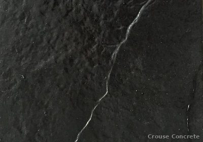 Broom-Finish Dark Concrete Slab