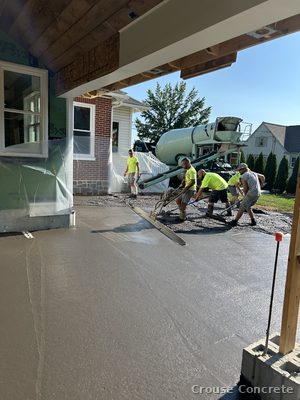 Crew Placing a Concrete Slab